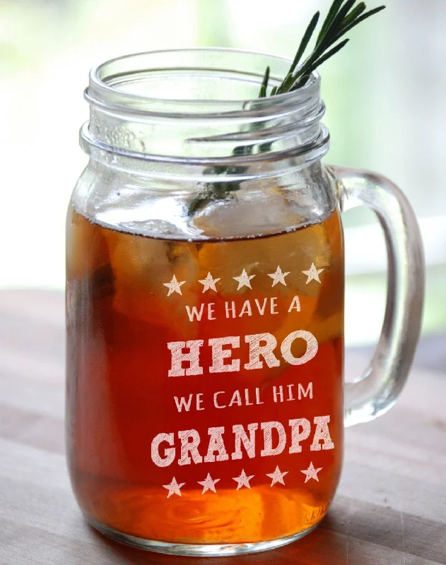 We have a Hero We Call Him Grandpa Fathers Day Gift Engraved Mason Jar Drinking Beer Mug Glass Etched Grandfather Papa Poppa Grandkids